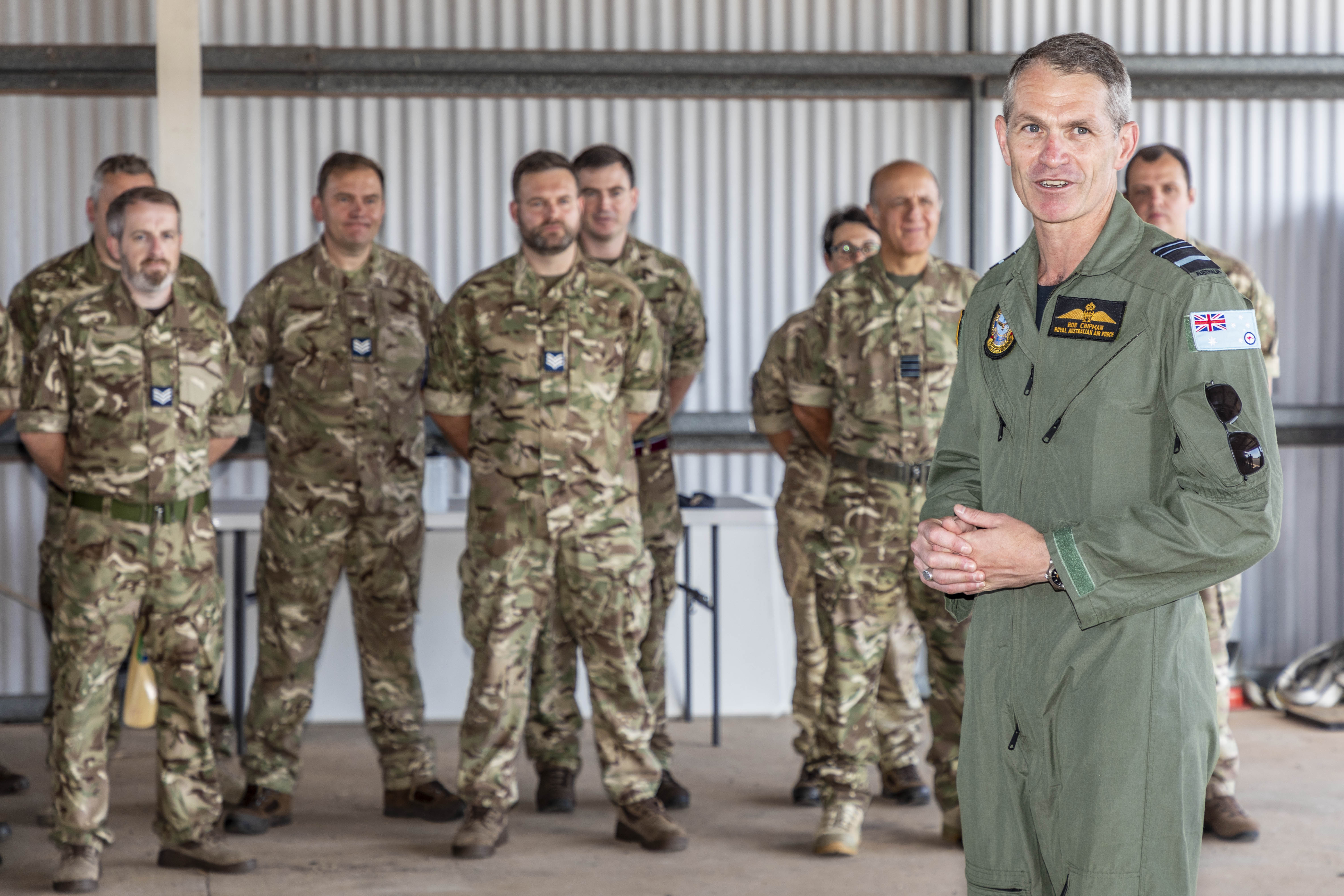 Image shows RAF Personnel standing together. 